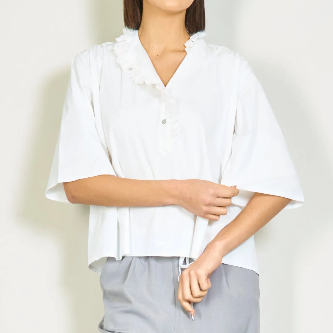 Blouse with lace trim and ruffle details wholesale