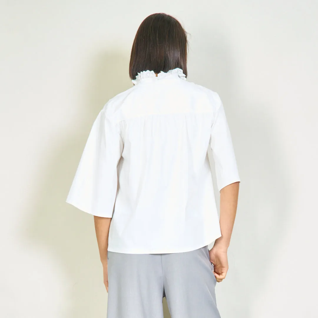 Blouse with lace trim and ruffle details wholesale